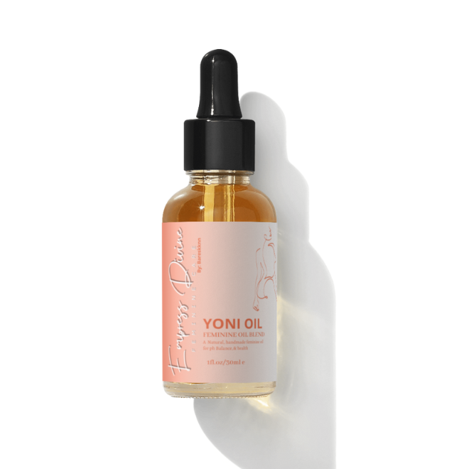Empress Divine Yoni oil in glass bottle and black dropper -oil is contains natural plant based ingredients