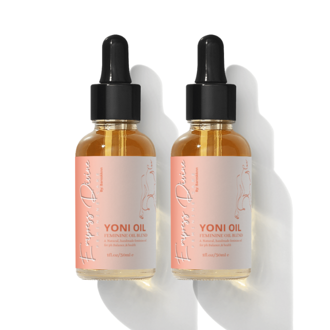 Empress Divine Yoni oil in  two separate glass bottle and black droppers -oil is contains natural plant based ingredients